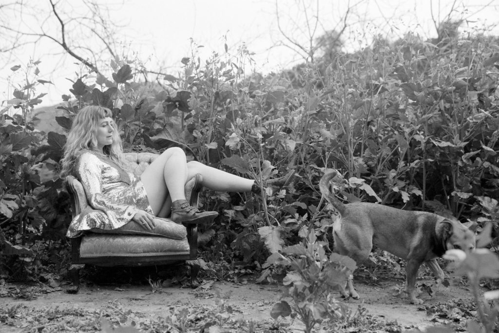 creative black and white film photo of a woman in the hills of Topanga canyon, California