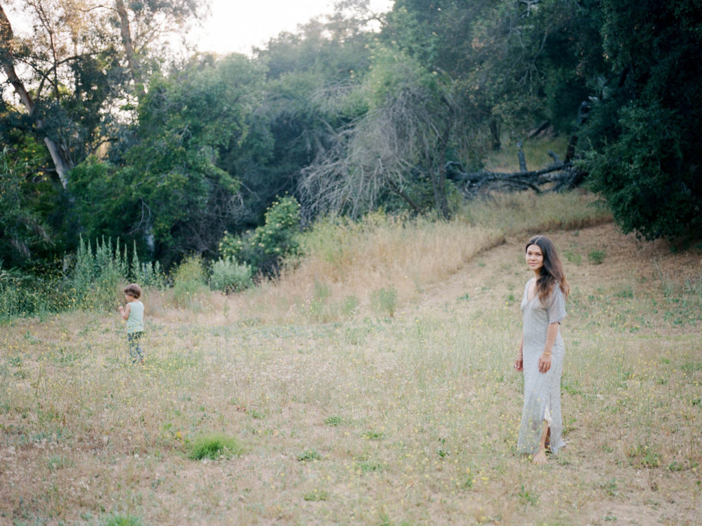 mother and son in a field 