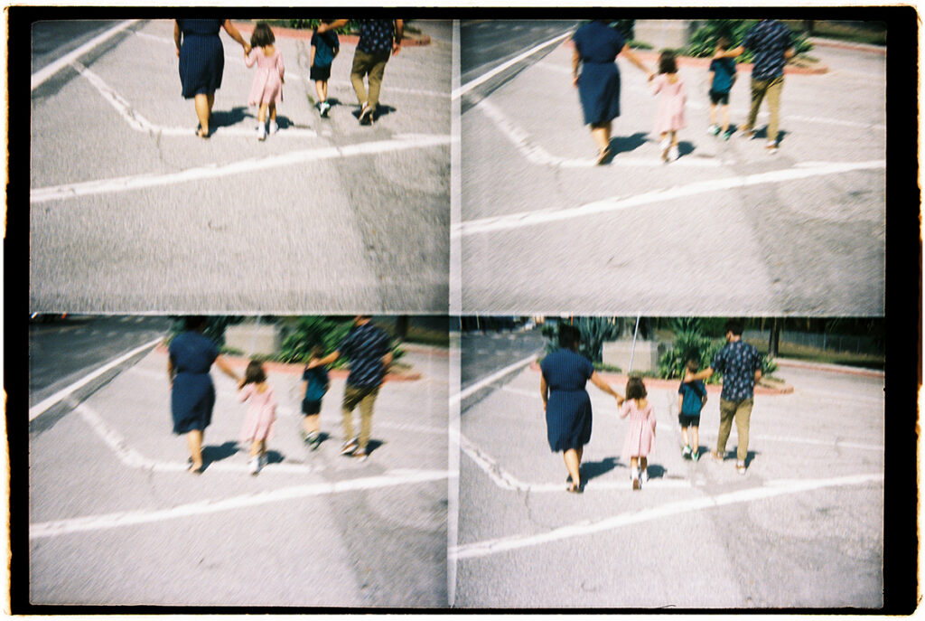 Four panel photograph of two adults and a child crossing a street, the images blurry and exhibiting motion.